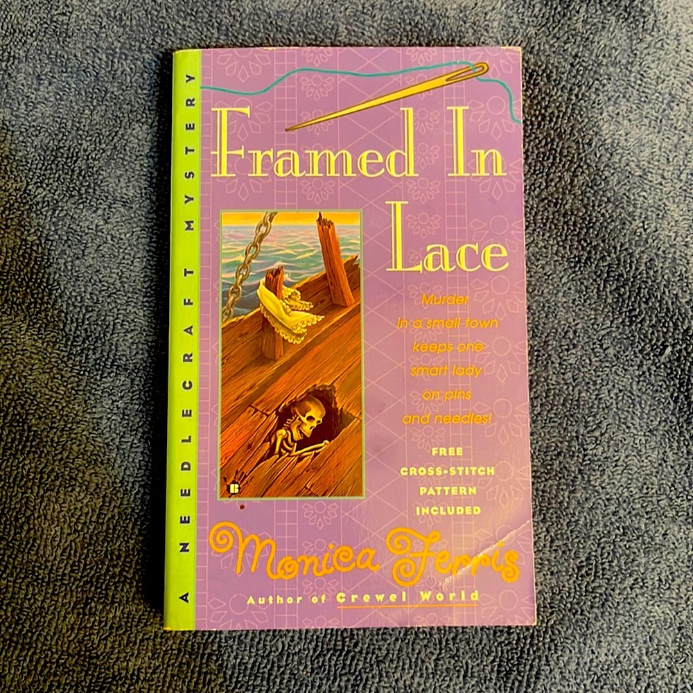 Framed in Lace paperback book by Monica Ferris